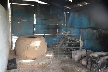 A building with a large round object  AI-generated content may be incorrect.